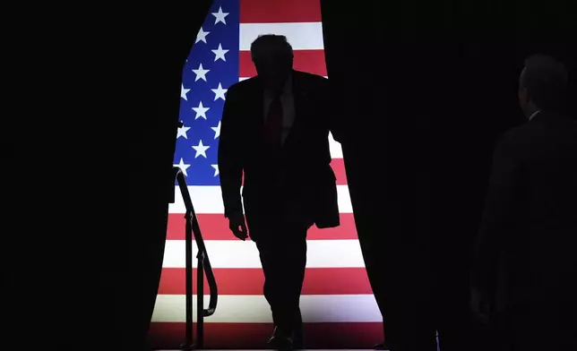 Republican presidential nominee former President Donald Trump arrives at a campaign rally at PPG Paints Arena, Monday, Nov. 4, 2024, in Pittsburgh, Pa. (AP Photo/Evan Vucci)