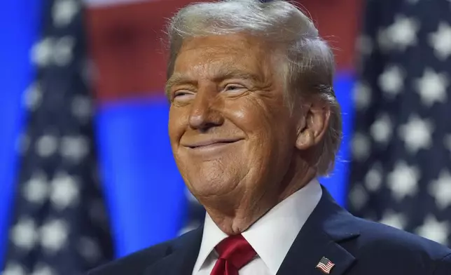 Republican presidential nominee former President Donald Trump smiles at an election night watch party at the Palm Beach Convention Center, Wednesday, Nov. 6, 2024, in West Palm Beach, Fla. (AP Photo/Evan Vucci)