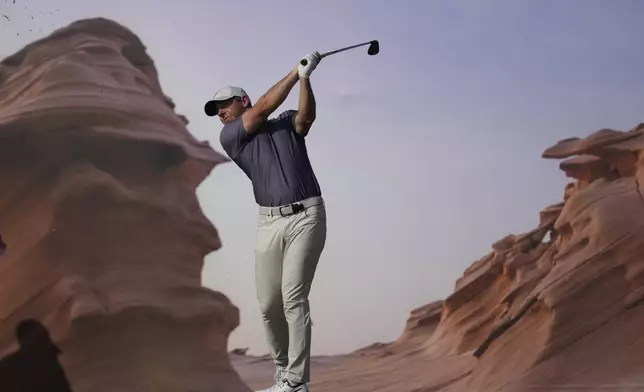 Rory McIlroy of Northern Ireland tees off at 15th hole during the second round of Abu Dhabi Golf Championship in Abu Dhabi, United Arab Emirates, Friday, Nov. 8, 2024. (AP Photo/Altaf Qadri)