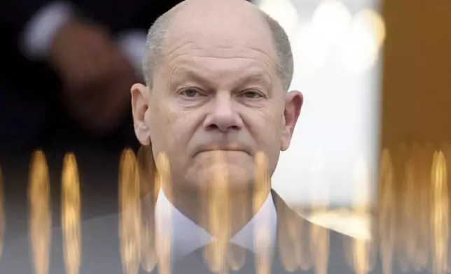 German Chancellor Olaf Scholz leaves Bellevue Palace in Berlin Thursday, Nov. 7, 2024. (Kay Nietfeld/dpa via AP)