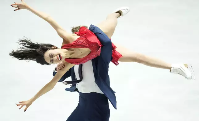 Madison Chock and Evan Bates of the U.S. compete in the ice dance rhythm dance program at the Grand Prix of Figure Skating series competition in Tokyo, Japan, Friday, Nov. 8, 2024. (AP Photo/Hiro Komae)