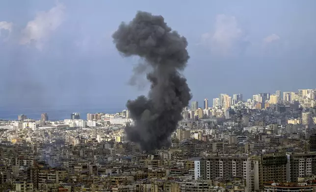 Smoke rises after an Israeli airstrike on Dahiyeh, in the southern suburb of Beirut, Lebanon, Wednesday, Nov. 13, 2024. (AP Photo/Hassan Ammar)