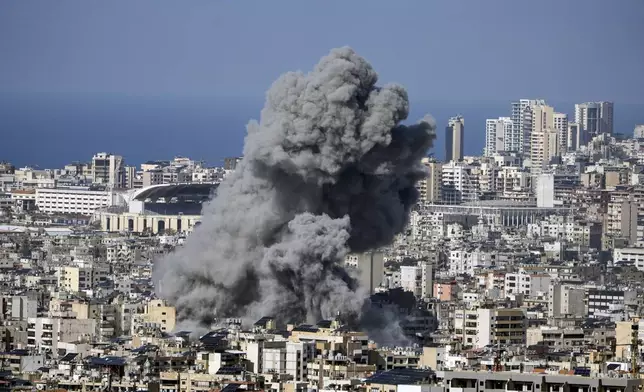 Smoke rises after an Israeli airstrike on Dahiyeh, in the southern suburb of Beirut, Lebanon, Tuesday, Nov. 12, 2024. (AP Photo/Bilal Hussein)