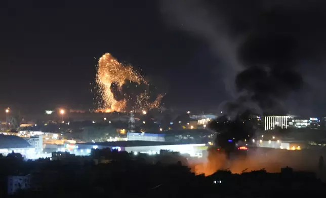 Smoke and fire rise from Israeli airstrikes in Dahiyeh, Beirut, Lebanon, Lebanon, Thursday, Nov. 7, 2024. (AP Photo/Hassan Ammar)