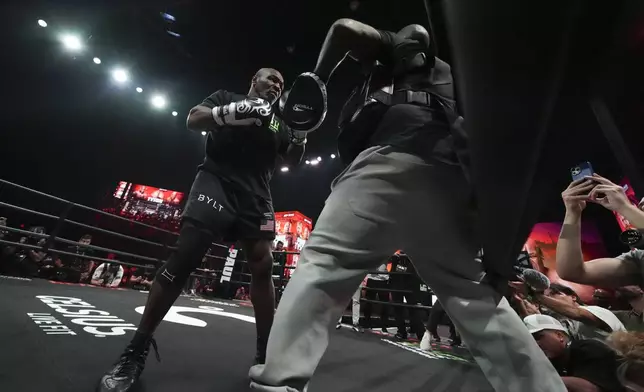 Mike Tyson works out ahead of his boxing match against Jake Paul, Tuesday, Nov. 12, 2024, in Irving, Texas. (AP Photo/Julio Cortez)