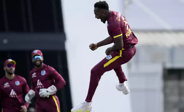 West Indies' Matthew Forde celebrates taking the wicket of England's Will Jacks during the third ODI cricket match at Kensington Oval in Bridgetown, Barbados, Wednesday, Nov. 6, 2024. (AP Photo/Ricardo Mazalan)