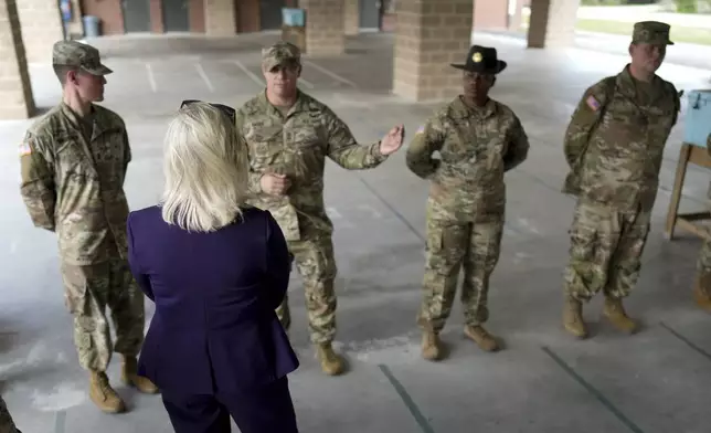 FILE - Army Secretary Christine Wormuth talks with soldiers at Fort Jackson, a U.S. Army Training Center, in Columbia, S.C., Sept. 25, 2024. (AP Photo/Chris Carlson, File)