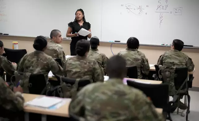 Recruits participate in the Army's future soldier prep course that gives lower-performing recruits up to 90 days of academic or fitness instruction to help them meet military standards, at Fort Jackson, a U.S. Army Training Center, in Columbia, S.C., Sept. 25, 2024. (AP Photo/Chris Carlson)