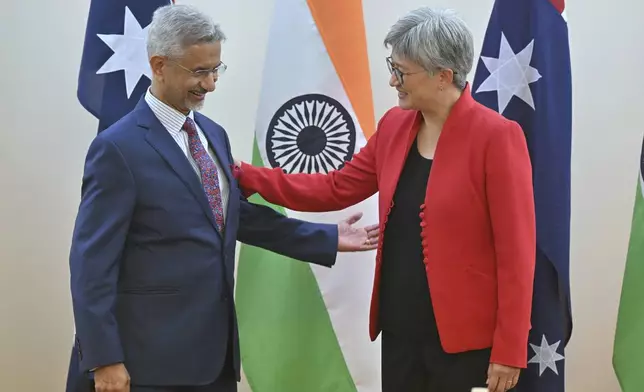 India's External Affairs Minister S. Jaishankar, left, and Australia's Foreign Minister Penny Wong meet at Parliament House in Canberra, Australia, Tuesday, Nov. 5, 2024. (Mick Tsikas/AAP Image via AP)