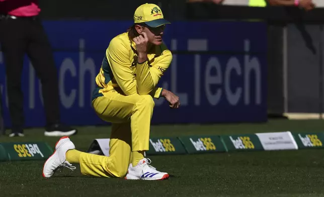 Australia's Adam Zampa kneels after dropping a catch against Pakistan during their one day international cricket match in Perth, Australia, Sunday, Nov. 10, 2024. (AP Photo/Trevor Collens)