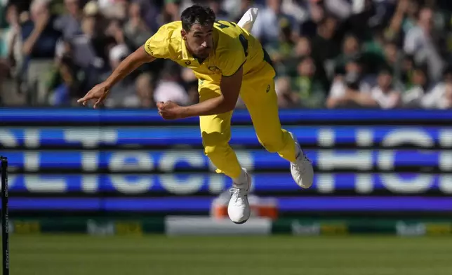 Australia's Mitchell Starc bowls to Pakistan during their one day international cricket match in Melbourne, Monday, Nov. 4, 2024. (AP Photo/Asanka Brendon Ratnayake)