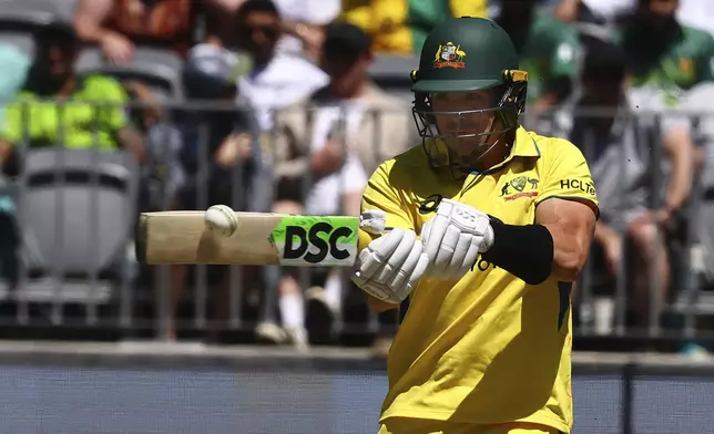 Australia's Sean Abbott bats against Pakistan during their one day international cricket match in Perth, Australia, Sunday, Nov. 10, 2024. (AP Photo/Trevor Collens)