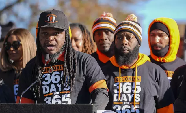 Sean Wees, director of Safe Streets' Brooklyn site, speaks during a press conference to celebrate achieving over 365 days without a homicide within the Brooklyn neighborhood Safe Streets catchment zone, Tuesday, Nov. 12, 2024, in Baltimore. (AP Photo/Stephanie Scarbrough)