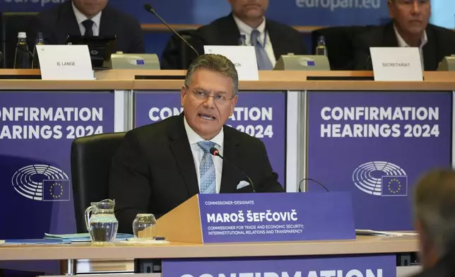 Slovakia's Maros Sefcovic, candidate for Commissioner for Trade and Economic Security, speaks during his confirmation hearing at the European Parliament in Brussels on Monday, Nov. 4, 2024. (AP Photo/Virginia Mayo)