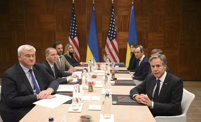 United States Secretary of State Antony Blinken, right, meets with Ukraine's Foreign Minister Andrii Sybiha, left, in Brussels, Wednesday, Nov. 13, 2024. (Nicolas Tucat, Pool Photo via AP)