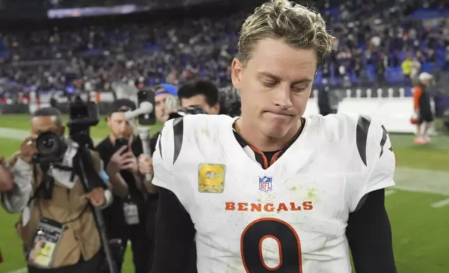 Cincinnati Bengals quarterback Joe Burrow pauses on the field after an NFL football game against the Baltimore Ravens, Thursday, Nov. 7, 2024, in Baltimore. The Ravens won 35-34. (AP Photo/Stephanie Scarbrough)