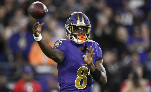 Baltimore Ravens quarterback Lamar Jackson passes the ball during the first half of an NFL football game against the Cincinnati Bengals, Thursday, Nov. 7, 2024, in Baltimore. (AP Photo/Nick Wass)