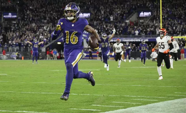 Baltimore Ravens wide receiver Tylan Wallace (16) runs for an 84-yard touchdown during the second half of an NFL football game against the Cincinnati Bengals, Thursday, Nov. 7, 2024, in Baltimore. (AP Photo/Nick Wass)