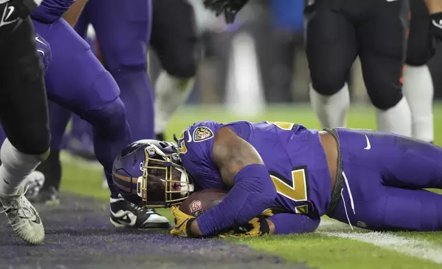 Baltimore Ravens running back Derrick Henry scores a touchdown during the first half of an NFL football game against the Cincinnati Bengals, Thursday, Nov. 7, 2024, in Baltimore. (AP Photo/Stephanie Scarbrough)