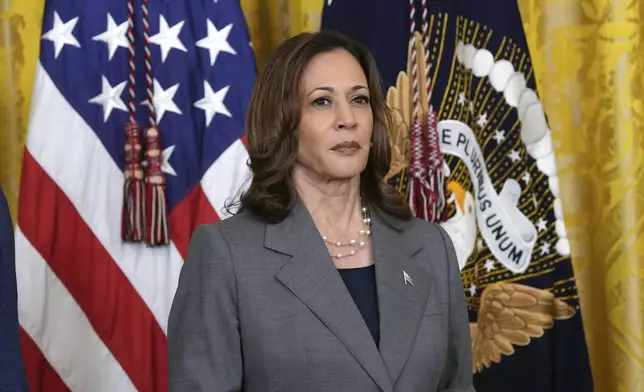 Vice President Kamala Harris listens during an event with President Joe Biden in the East Room of the White House in Washington, Thursday, Sept. 26, 2024. (AP Photo/Susan Walsh)