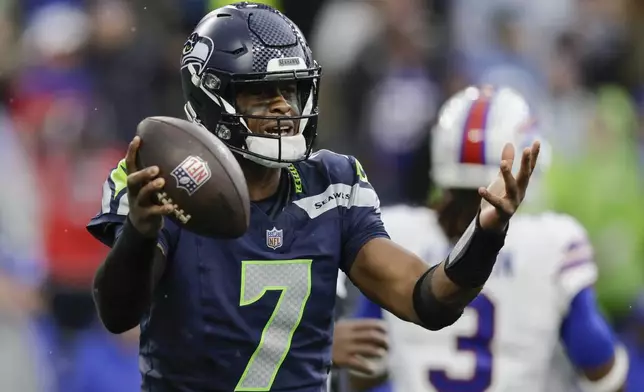 Seattle Seahawks quarterback Geno Smith (7) reacts to a call during the second half of an NFL football game against the Buffalo Bills, Sunday, Oct. 27, 2024, in Seattle. (AP Photo/John Froschauer)