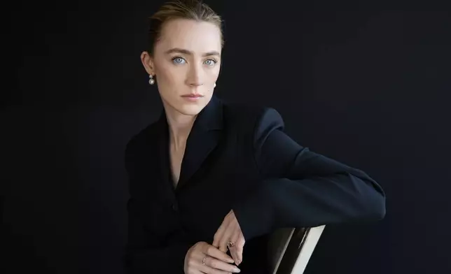 Saoirse Ronan, a cast member in "Blitz," poses for a portrait at the Four Seasons Hotel, Monday, Oct. 14, 2024, in Los Angeles. (AP Photo/Chris Pizzello)