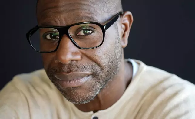 Steve McQueen, writer/director of "Blitz," poses for a portrait at the Four Seasons Hotel, Monday, Oct. 14, 2024, in Los Angeles. (AP Photo/Chris Pizzello)