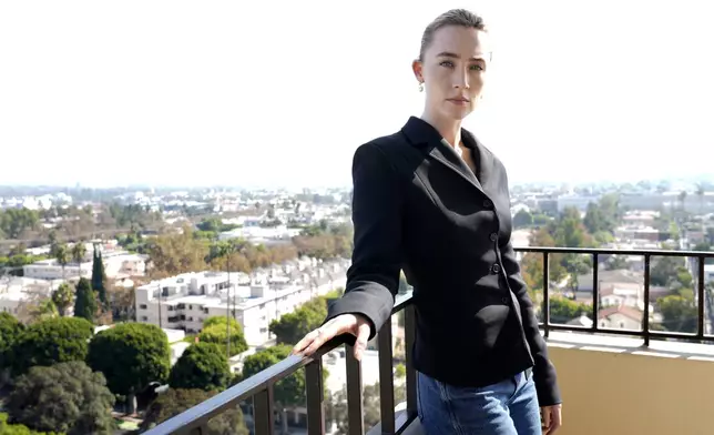 Saoirse Ronan, a cast member in "Blitz," poses for a portrait at the Four Seasons Hotel, Monday, Oct. 14, 2024, in Los Angeles. (AP Photo/Chris Pizzello)