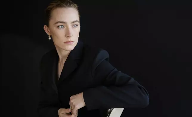 Saoirse Ronan, a cast member in "Blitz," poses for a portrait at the Four Seasons Hotel, Monday, Oct. 14, 2024, in Los Angeles. (AP Photo/Chris Pizzello)