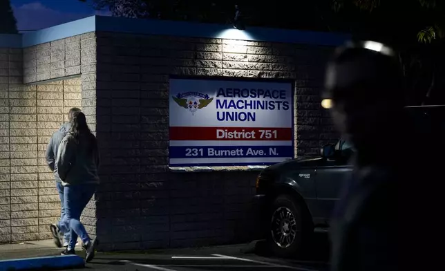 Boeing employees arrive to vote on a new contract offer from the company Monday, Nov. 4, 2024, at the Aerospace Machinists Union hall in Renton, Wash. (AP Photo/Lindsey Wasson)