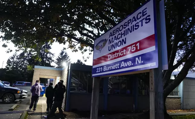 Boeing employees arrive to vote on a new contract offer from the company Monday, Nov. 4, 2024, at the Aerospace Machinists Union hall in Renton, Wash. (AP Photo/Lindsey Wasson)