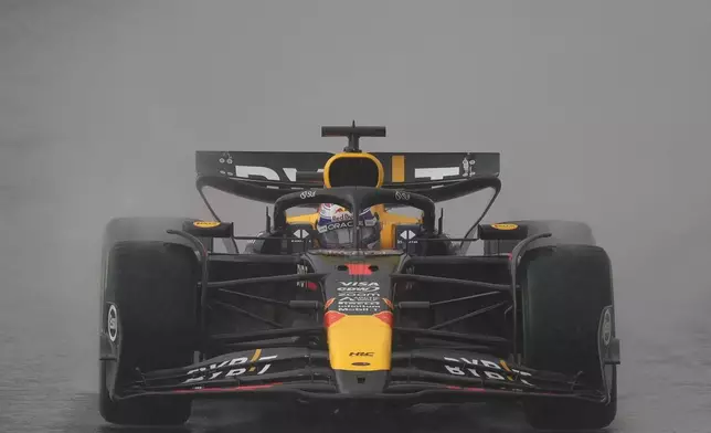 Max Verstappen, of Netherlands, steers his Red Bull during the Brazilian Formula One Grand Prix at the Interlagos race track in Sao Paulo, Sunday, Nov. 3, 2024. (AP Photo/Andre Penner)