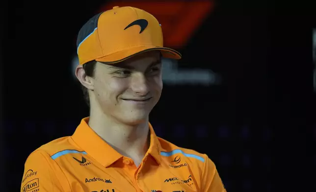 McLaren driver Oscar Piastri, of Australia, smiles during a press conference ahead of the Brazilian Formula One Grand Prix at the Interlagos race track in Sao Paulo, Brazil, Thursday, Oct. 31, 2024. (AP Photo/Andre Penner)