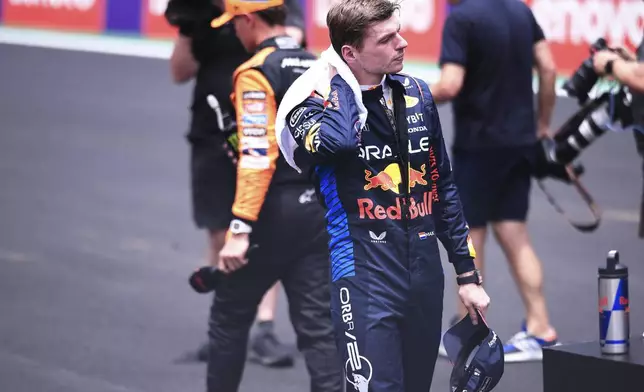 Red Bull driver Max Verstappen of the Netherlands walks on the track after the sprint race ahead of the Brazilian Formula One Grand Prix auto race at the Interlagos racetrack in Sao Paulo, Saturday, Nov. 2, 2024. (AP Photo/Ettore Chiereguini)