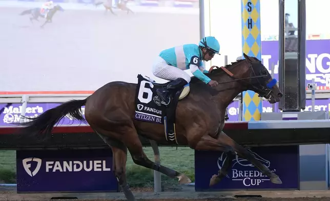 Martin Garcia rides Citizen Bull to victory in the Breeders' Cup Juvenile horse race at Santa Anita Park in Del Mar, Calif., Friday, Nov. 1, 2024. (AP Photo/Gregory Bull)