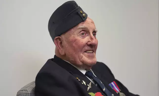 Michael Woods, 100-year-old World War II veteran, speaks during an interview in Dunstable, Bedfordshire, England, Tuesday, Nov. 5, 2024. (AP Photo/Kin Cheung)