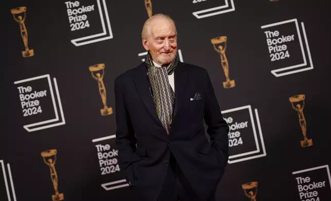 Charles Dance arrives at the Booker Prize award dinner in London, Tuesday, Nov. 12, 2024. (AP Photo/Alberto Pezzali)