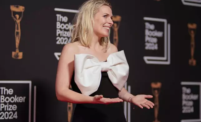 Sara Pascoe arrives at the Booker Prize award dinner in London, Tuesday, Nov. 12, 2024. (AP Photo/Alberto Pezzali)