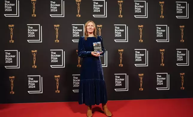 Samantha Harvey arrives at the Booker Prize award dinner in London, Tuesday, Nov. 12, 2024. (AP Photo/Alberto Pezzali)