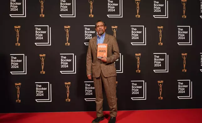 Percival Everett arrives at the Booker Prize award dinner in London, Tuesday, Nov. 12, 2024. (AP Photo/Alberto Pezzali)