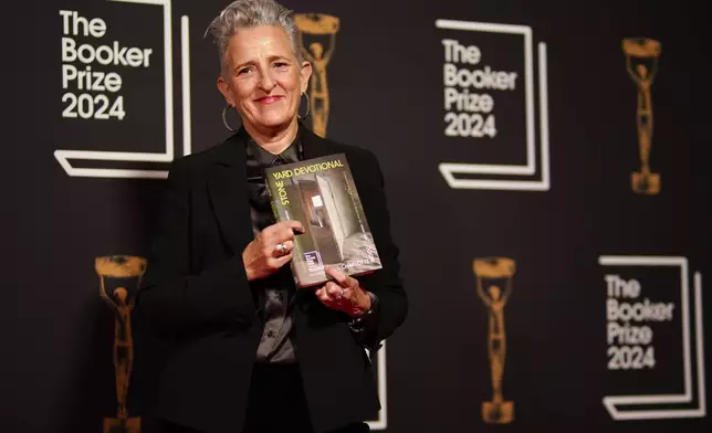 Charlotte Wood arrives at the Booker Prize award dinner in London, Tuesday, Nov. 12, 2024. (AP Photo/Alberto Pezzali)