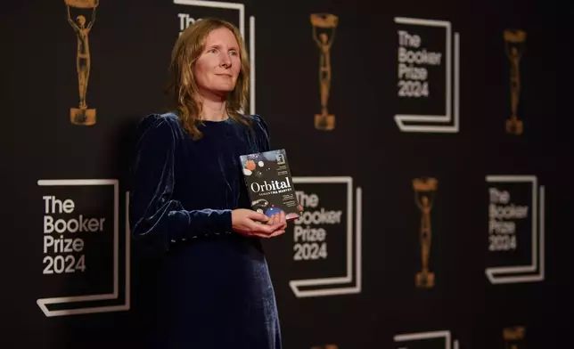 Samantha Harvey arrives at the Booker Prize award dinner in London, Tuesday, Nov. 12, 2024. (AP Photo/Alberto Pezzali)