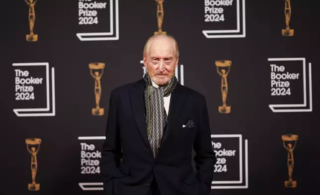 Charles Dance arrives at the Booker Prize award dinner in London, Tuesday, Nov. 12, 2024. (AP Photo/Alberto Pezzali)