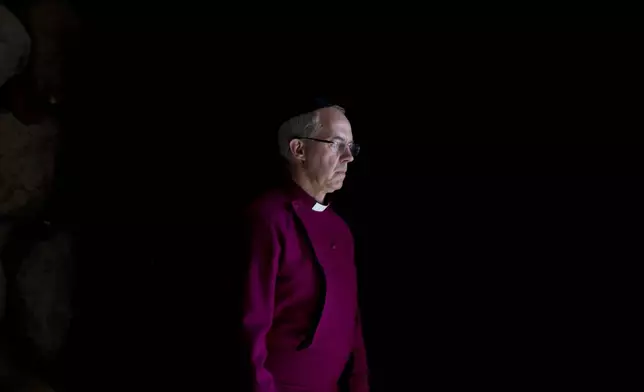 FILE - The Archbishop of Canterbury, Justin Welby, pays his respects at the Yad Vashem Holocaust memorial, in Jerusalem, Wednesday, May 3, 2017. (AP Photo/Ariel Schalit, File)