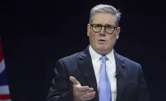 British Prime Minister Keir Starmer delivers a speech at the Interpol General Assembly in Glasgow, Scotland, Britain, Monday, Nov. 4, 2024. (Russell Cheyne/Pool Photo via AP)