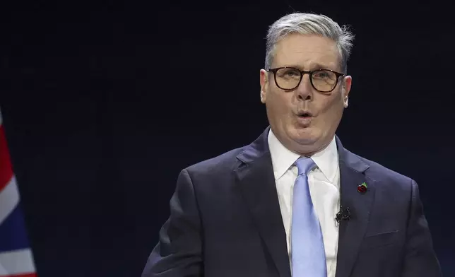 British Prime Minister Keir Starmer delivers a speech at the Interpol General Assembly in Glasgow, Scotland, Britain, Nov. 4, 2024. (Russell Cheyne/Pool Photo via AP)