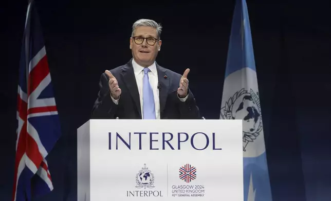 British Prime Minister Keir Starmer delivers a speech at the Interpol General Assembly in Glasgow, Scotland, Britain, Nov. 4, 2024. Russell Cheyne/Pool Photo via AP)