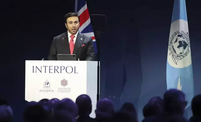 The President of Interpol, Ahmed Naser Al Raise, speaking at the opening ceremony for the Interpol General Assembly in Glasgow, Scotland, Monday, Nov. 4, 2024. (AP Photo/Scott Heppell)