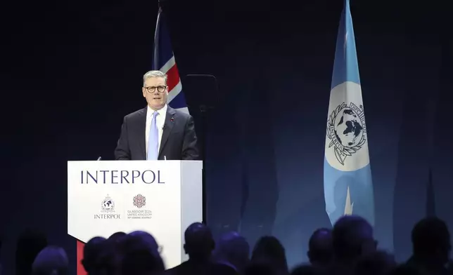 Britain's Prime Minister Keir Starmer speaking at the opening ceremony for the Interpol General Assembly in Glasgow, Scotland Monday, Nov. 4, 2024. (AP Photo/Scott Heppell)