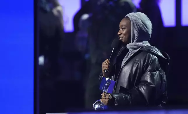 Little Simz before presenting Busta Rhymes with the 2024 MTV EMAs global icon award during the MTV European Music Awards in Manchester, England, Sunday, Nov. 10, 2024. (Scott A Garfitt/Invision/AP)